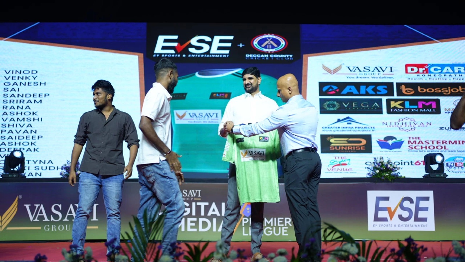 Green team jersey presented on stage